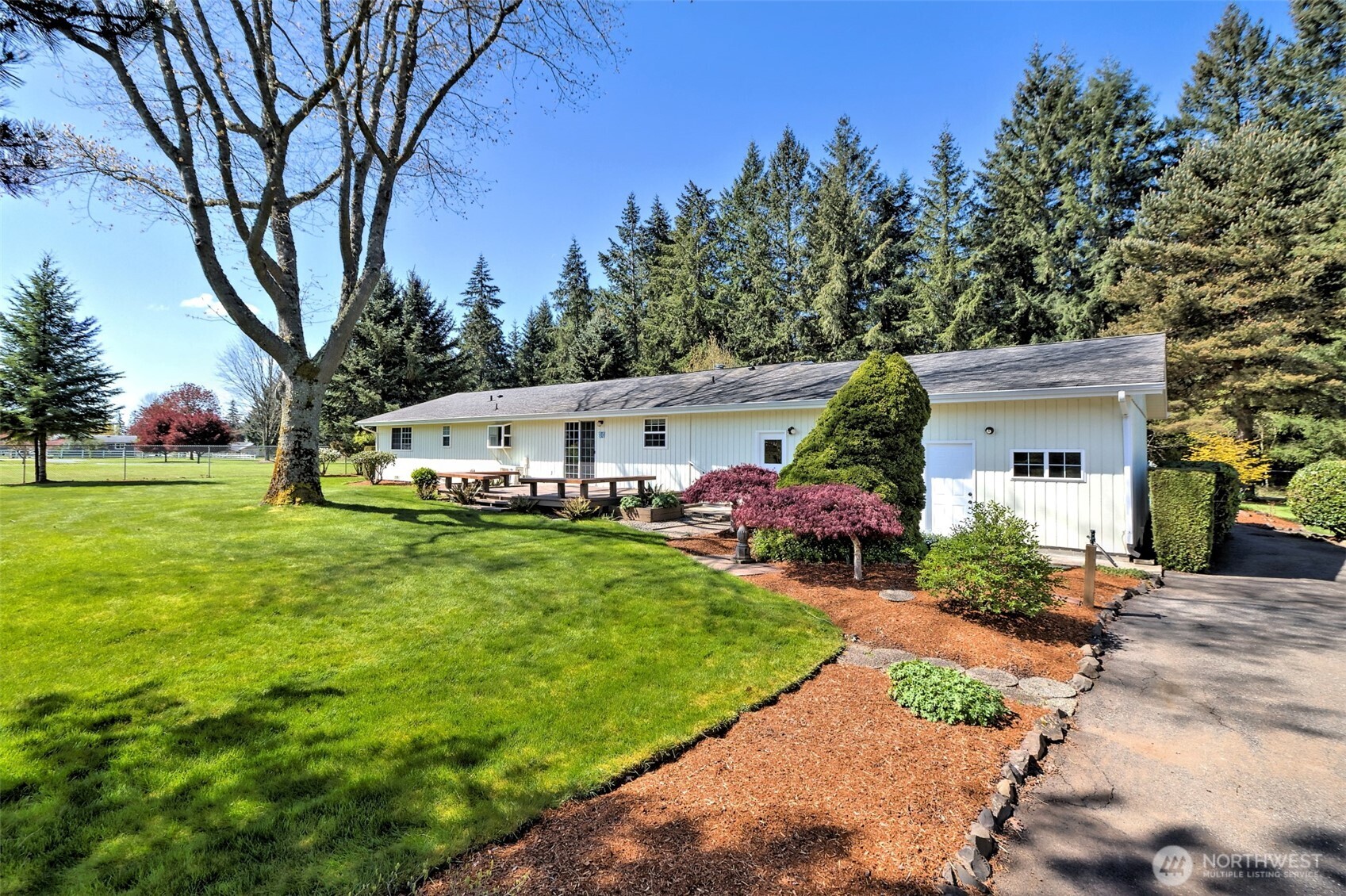 247-24 Woodard Road Chehalis, WA 98532 - Photo 27 of 40 a view of a house with garden and a trees