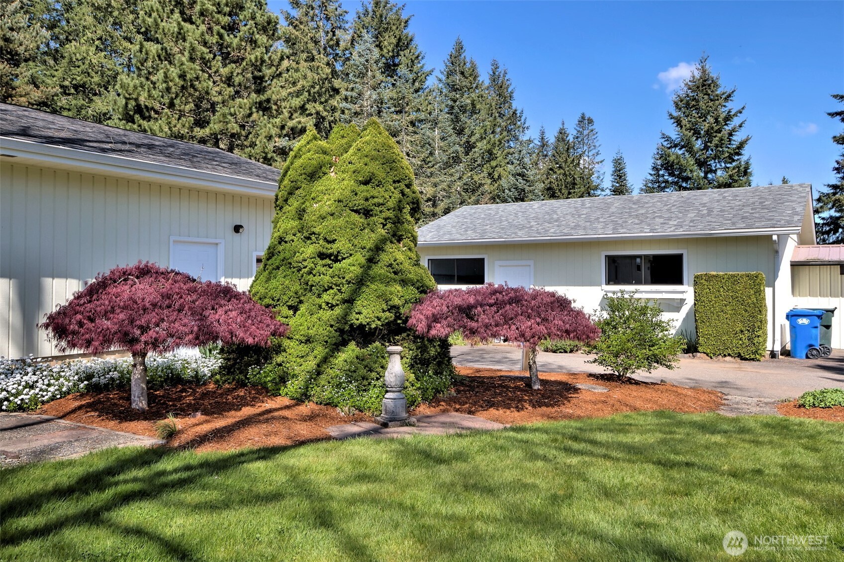 247-24 Woodard Road Chehalis, WA 98532 - Photo 28 of 40 a view of a house with backyard and a garden