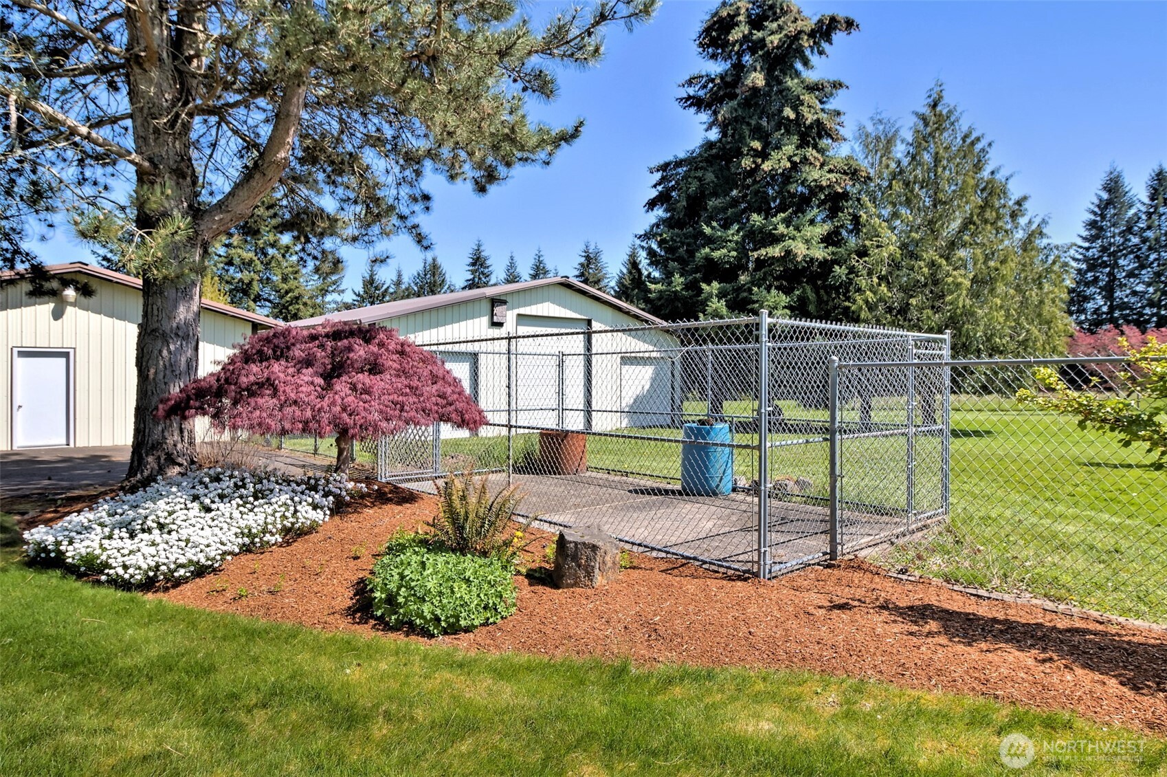 247-24 Woodard Road Chehalis, WA 98532 - Photo 33 of 40 a view of a backyard with a garden