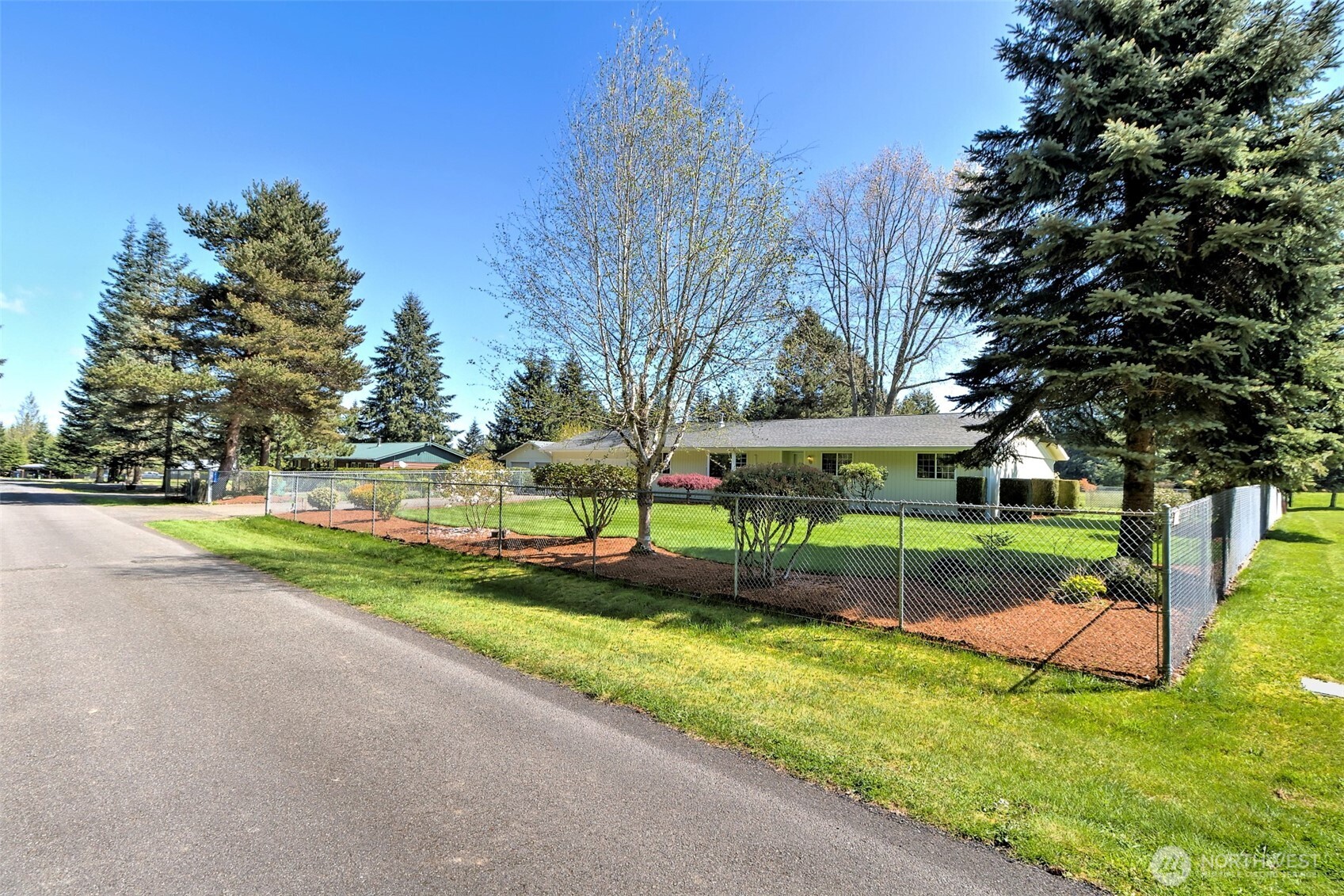 247-24 Woodard Road Chehalis, WA 98532 - Photo 5 of 40 a view of backyard with swimming pool and green space
