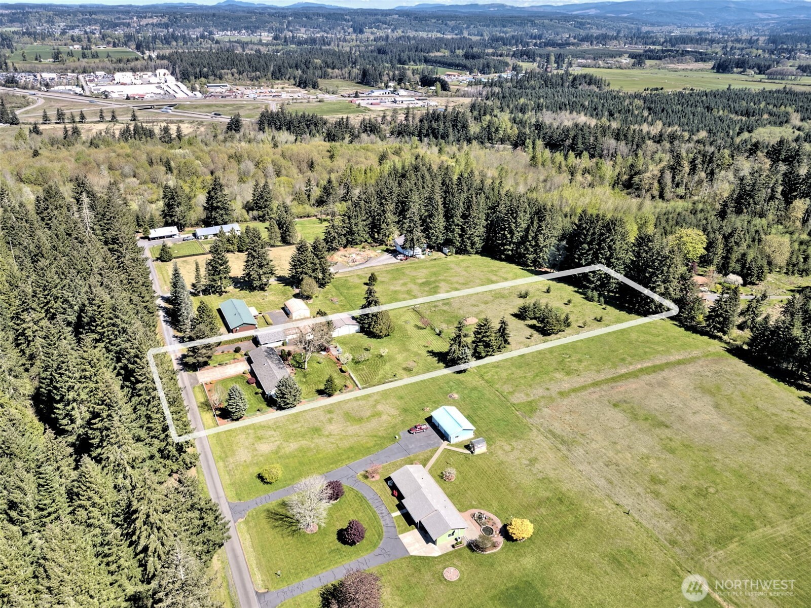 247-24 Woodard Road Chehalis, WA 98532 - Photo 6 of 40 an aerial view of a house with yard