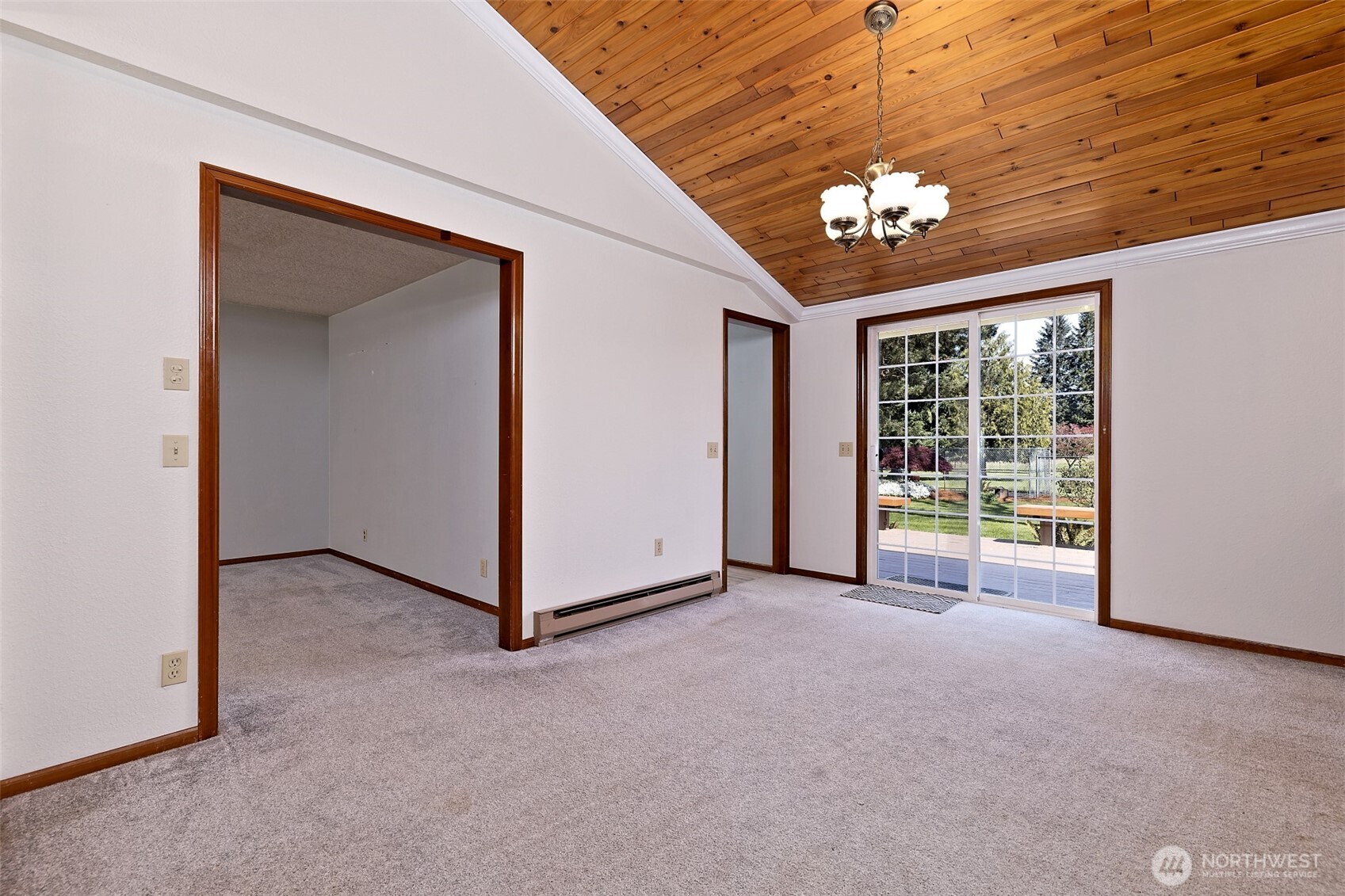 247-24 Woodard Road Chehalis, WA 98532 - Photo 8 of 40 a view of an empty room with a window and chandelier fan