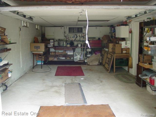 10361 North Rushton Road South Lyon, MI 48178 - Photo 24 of 33 Basement Attached Garage