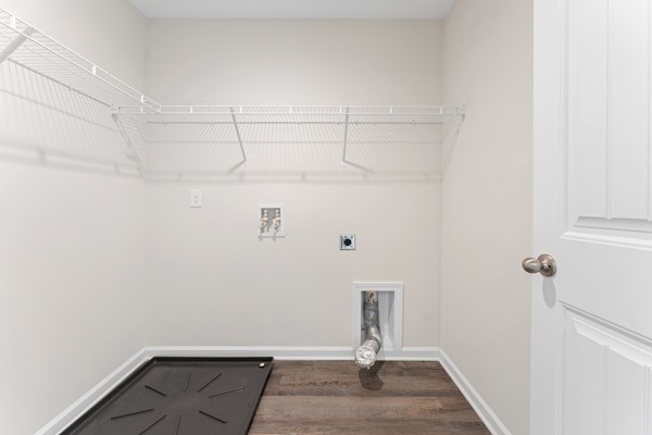 249 Samuel Street Pendleton, SC 29670 - Photo 11 of 33 This spacious laundry area features ample storage and modern connections, ready for your appliances.