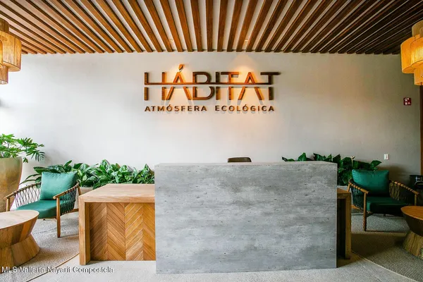 an outdoor dining space with furniture from a balcony