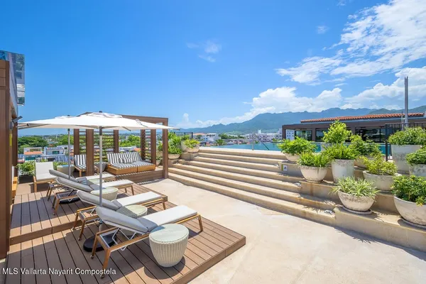 a view of a house with swimming pool