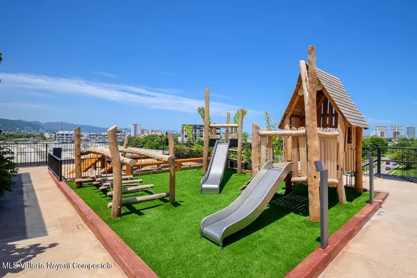 a view of balcony with furniture