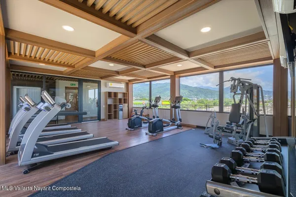 a view of a room with gym equipment