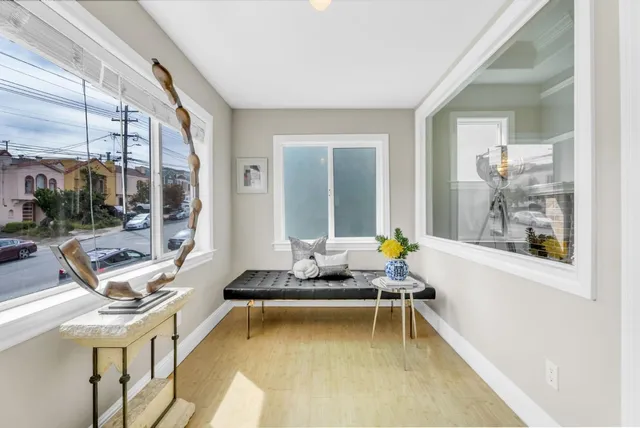 a bathroom with a mirror a sink and a mirror