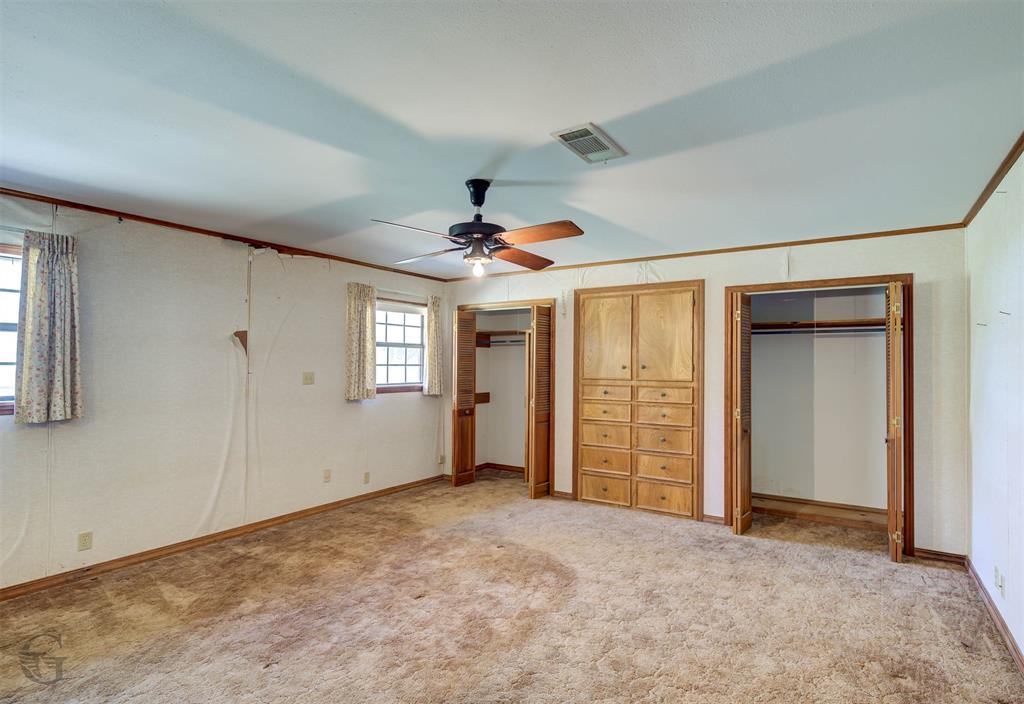 816 Bogan Lane Coushatta, LA 71019 - Photo 17 of 19 wooden floor in an empty room with a window