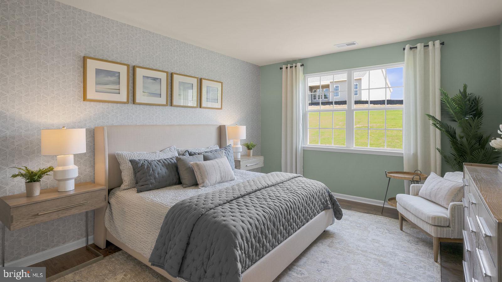 249 Hydrangea Way Winchester, VA 22602 - Photo 11 of 19 a bedroom with a bed and a window