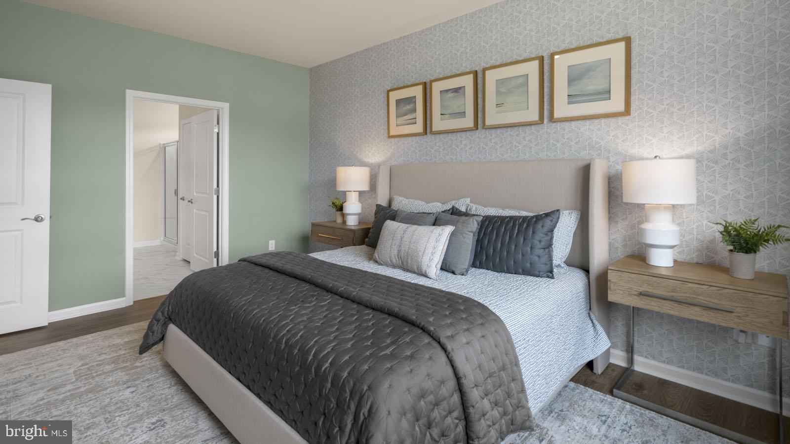 249 Hydrangea Way Winchester, VA 22602 - Photo 14 of 19 a bedroom with bed and a night stand