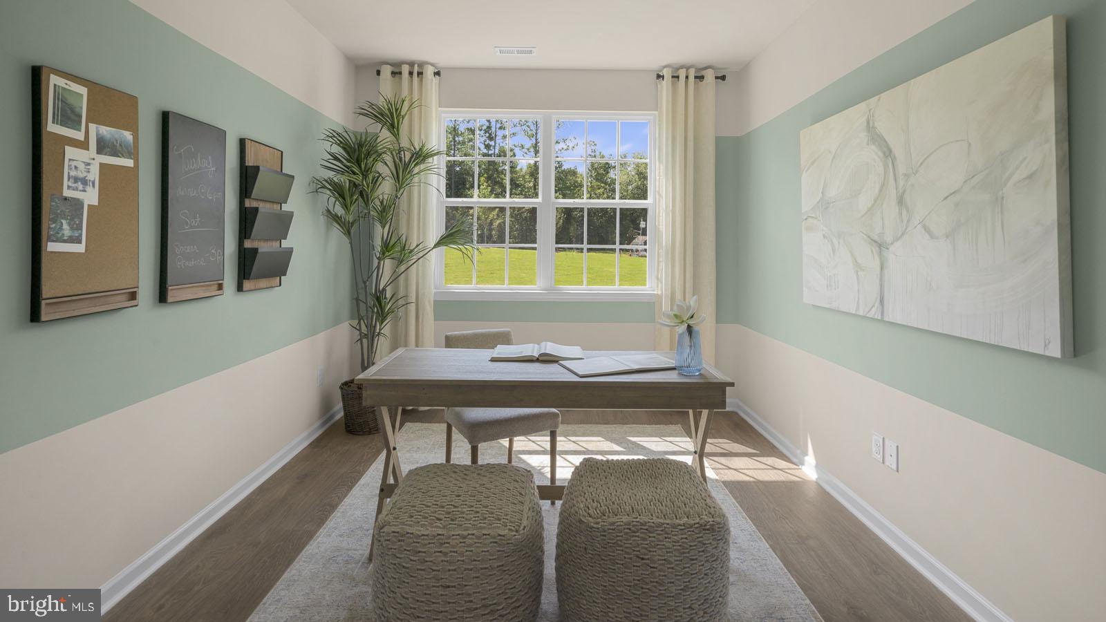 249 Hydrangea Way Winchester, VA 22602 - Photo 18 of 19 a view of a room with a table and chairs