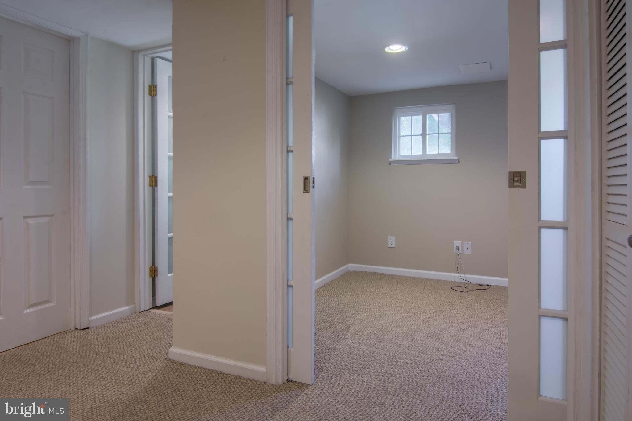 74 Murdock Road Baltimore, MD 21212 - Photo 22 of 30 a view of an empty room with windows and closet