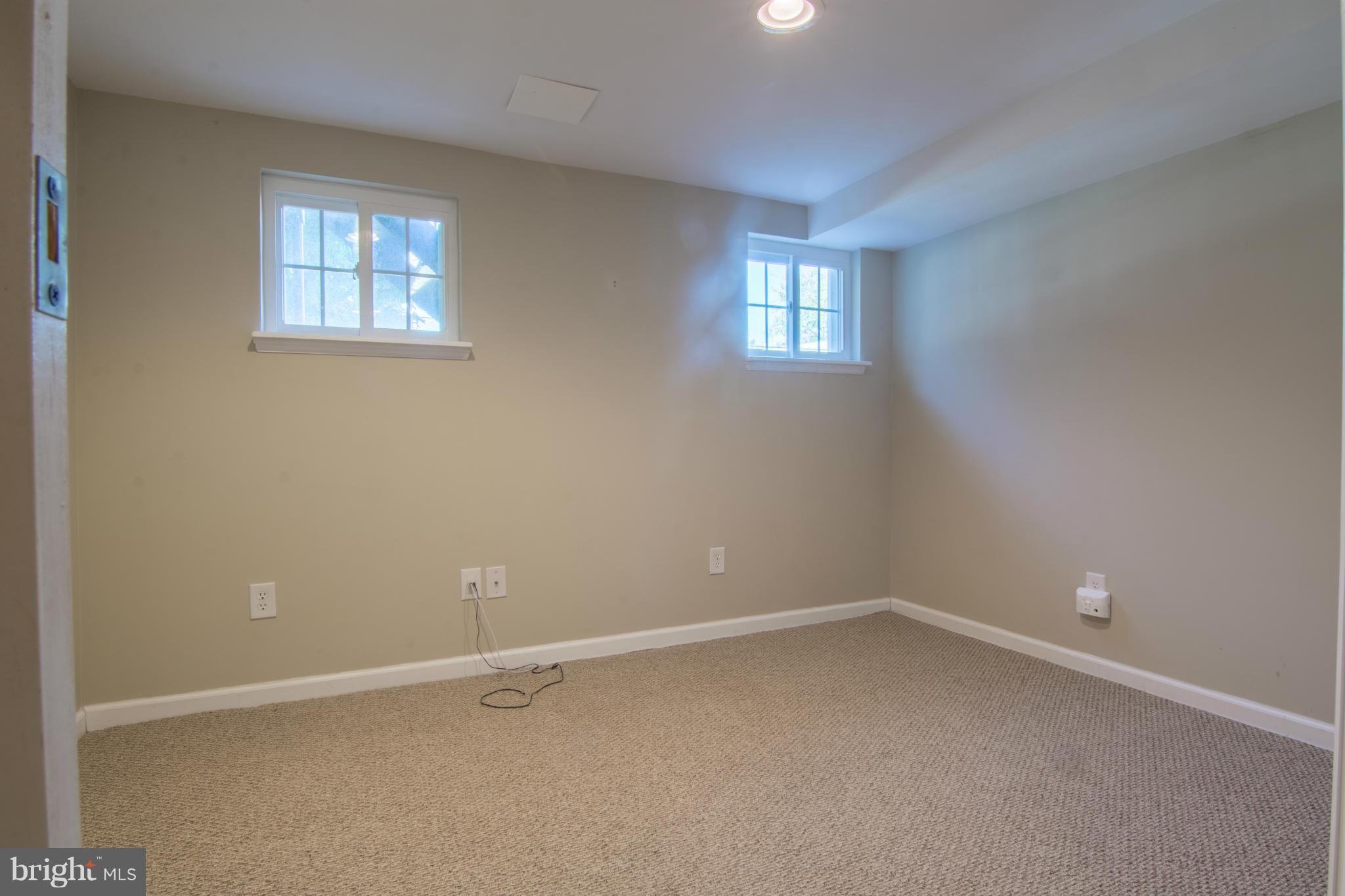 74 Murdock Road Baltimore, MD 21212 - Photo 23 of 30 an empty room with windows