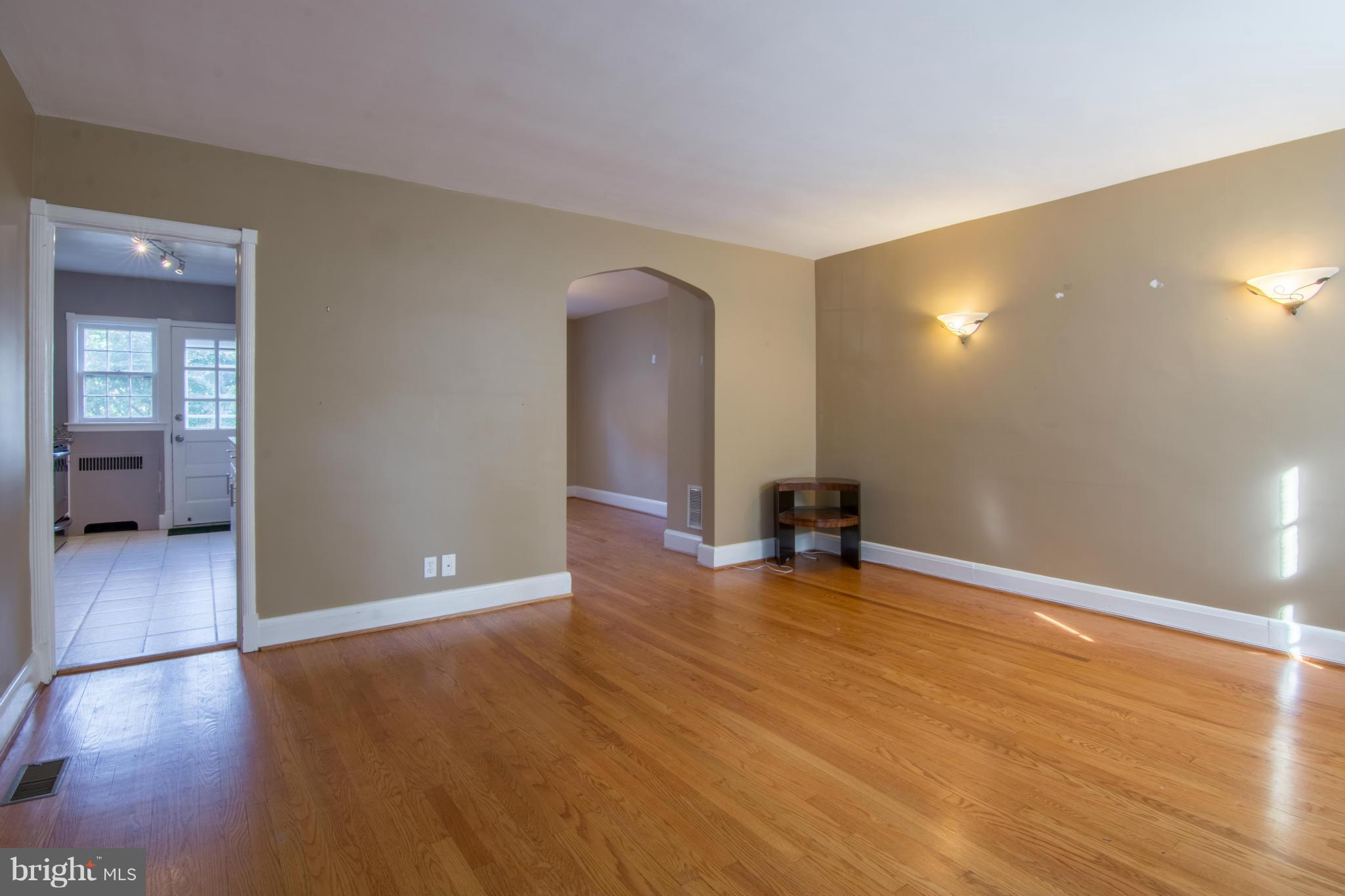 74 Murdock Road Baltimore, MD 21212 - Photo 8 of 30 a view of a room with wooden floor and a window