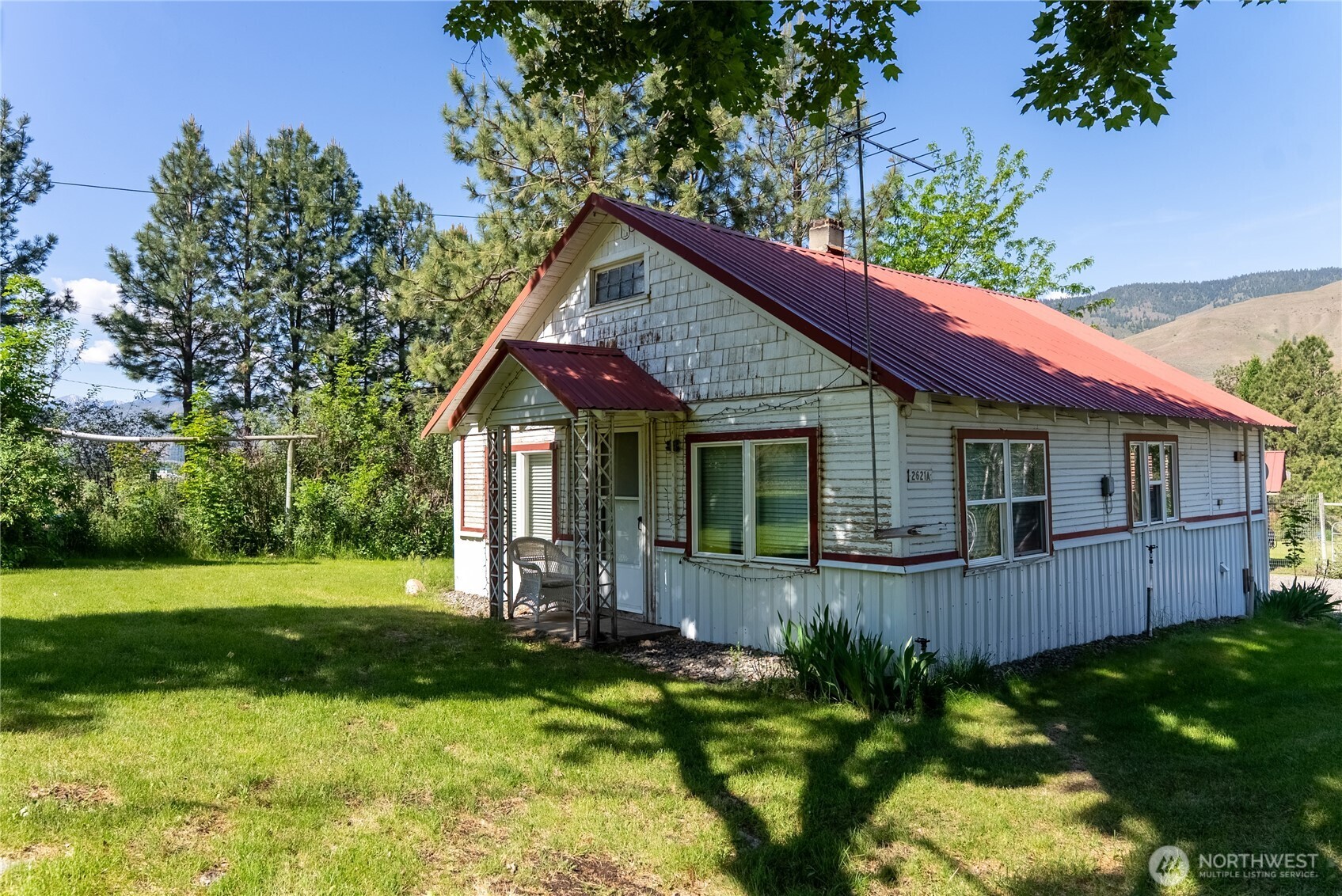 2621 Highway 153 Twisp, WA 98856 - Photo 21 of 40 a view of a house with backyard and garden