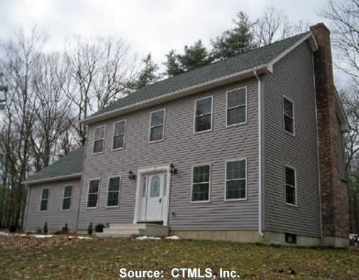 26 Jordan Road Windham, CT 06226 - Photo 1 of 1 a front view of a house with a yard