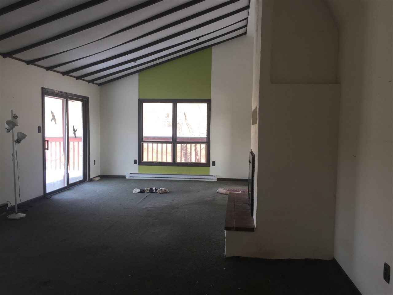 8775 Pomeroy Road Rockton, IL 61072 - Photo 5 of 12 a view of an empty room with a window