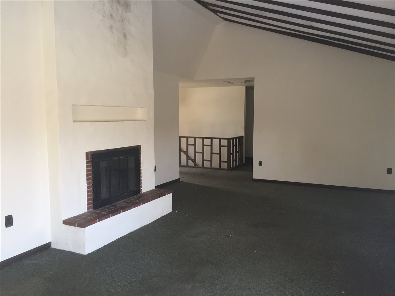 8775 Pomeroy Road Rockton, IL 61072 - Photo 6 of 12 a living room with a fireplace