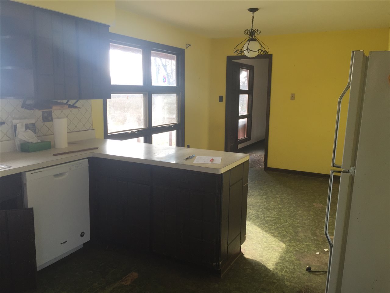 8775 Pomeroy Road Rockton, IL 61072 - Photo 8 of 12 a kitchen with sink and cabinets