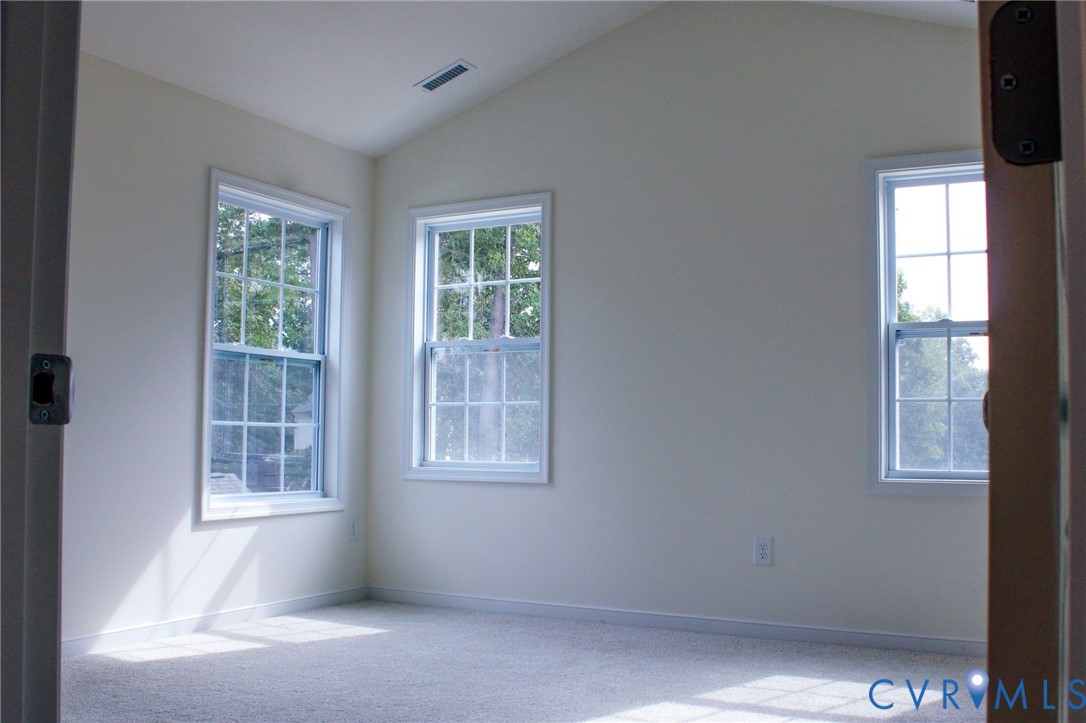 11632 Fort Cosby Drive Midlothian, VA 23112 - Photo 5 of 9 a view of an empty room with a window
