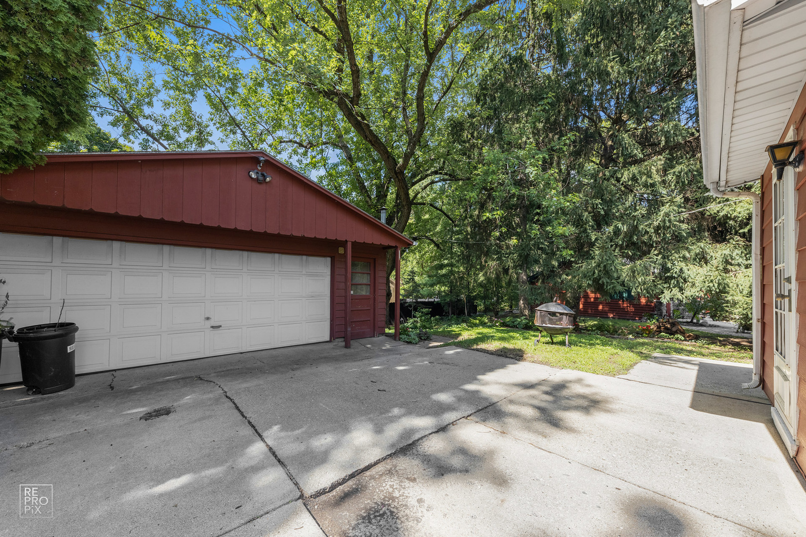 1382 Raymond Street South Elgin, IL 60177 - Photo 12 of 14 a backyard of a house with a yard