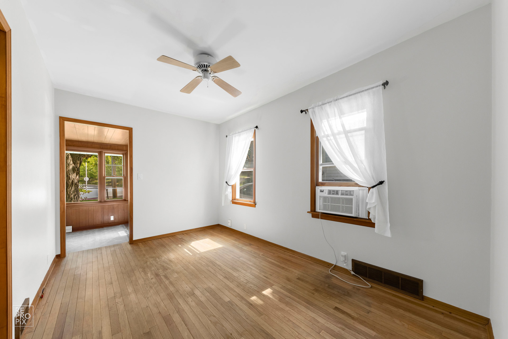 1382 Raymond Street South Elgin, IL 60177 - Photo 3 of 14 an empty room with windows and closet