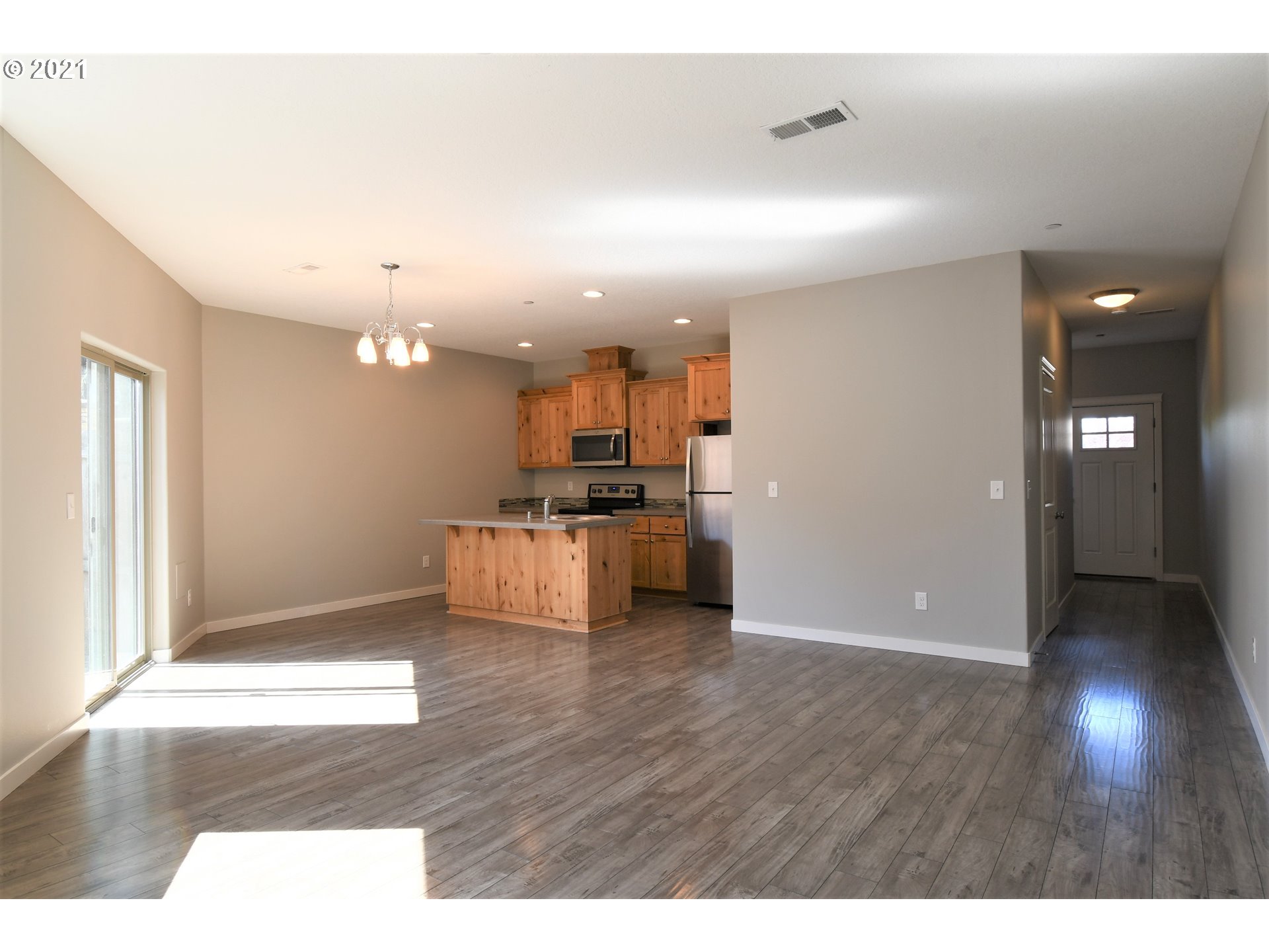 100 North 44th Place Ridgefield, WA 98642 - Photo 2 of 21 a view of a kitchen with a sink and a window