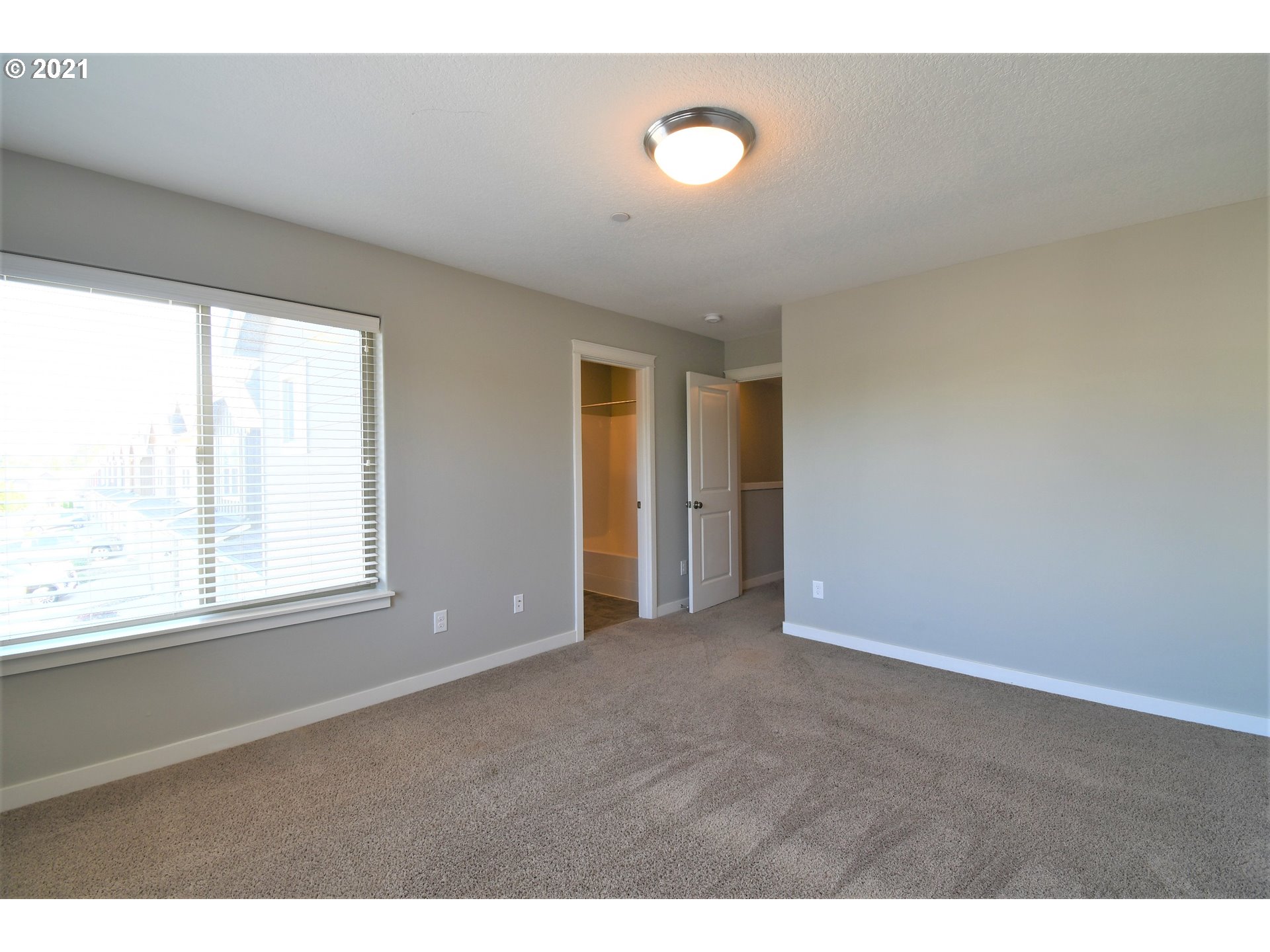 100 North 44th Place Ridgefield, WA 98642 - Photo 12 of 21 a view of an empty room with a window