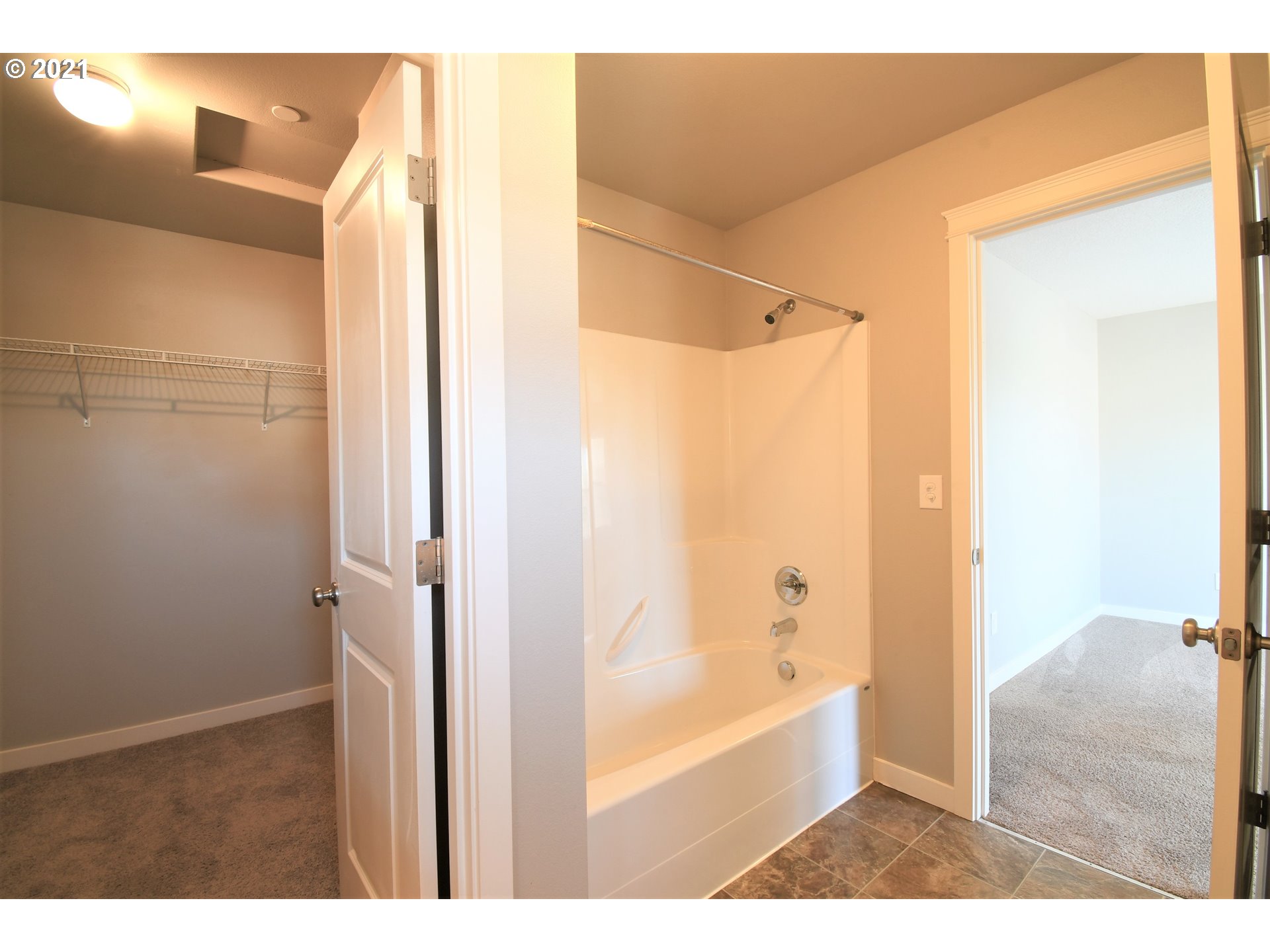 100 North 44th Place Ridgefield, WA 98642 - Photo 13 of 21 a bathroom with a bathtub and shower