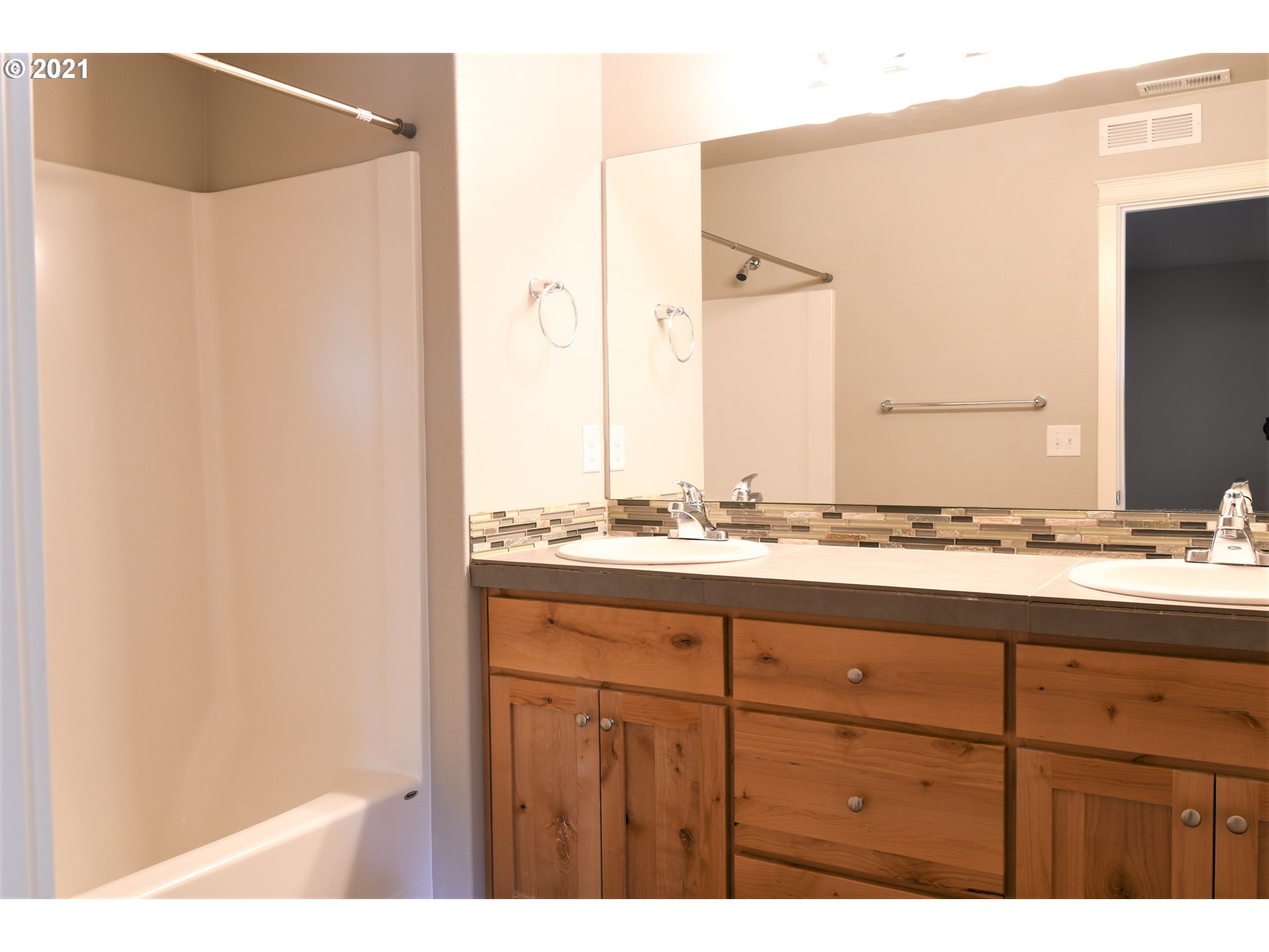 100 North 44th Place Ridgefield, WA 98642 - Photo 18 of 21 a bathroom with a sink and a mirror