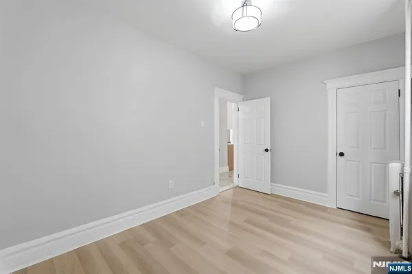 a view of a hallway with windows