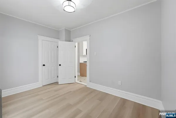 a view of a hallway with a window