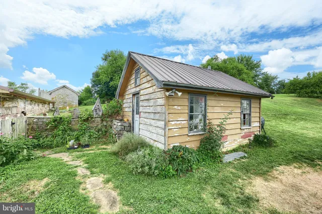 a house view with a garden space