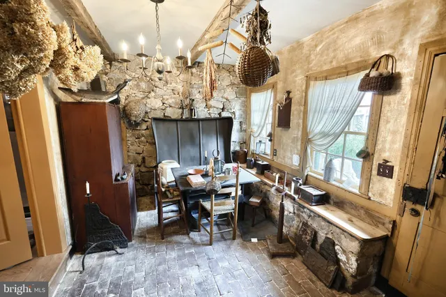 a view of a bedroom with washer and dryer