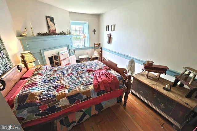 a view of a wooden house with a yard