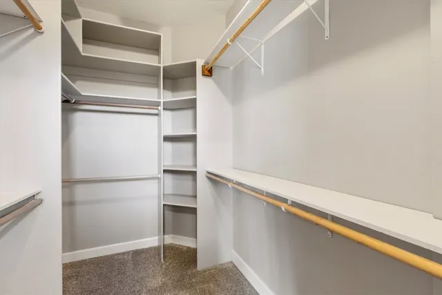 a view of an empty walk in closet