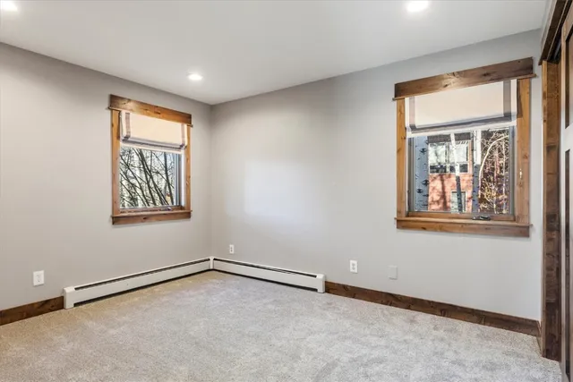 an empty room with windows