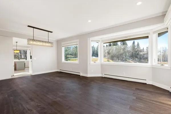 a kitchen with a sink and a large window