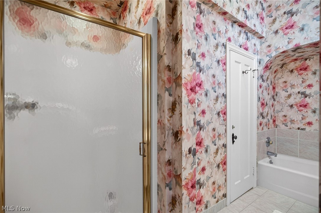 3498 Bainbridge Road Cleveland Heights, OH 44118 - Photo 30 of 50 Bathroom featuring wallpapered walls, a shower stall, and a bath
