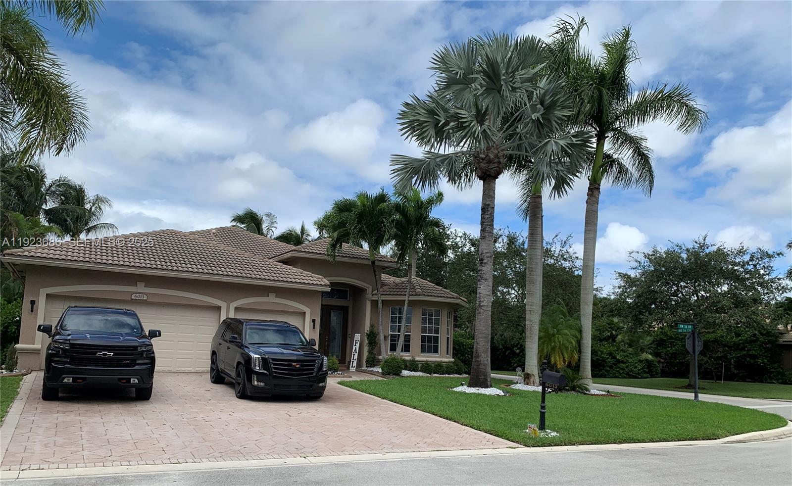 a car parked in front of a house