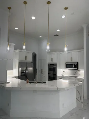 $6,000 | 6013 Northwest 56th Drive, Unit 6013, Coral Springs, FL 33067