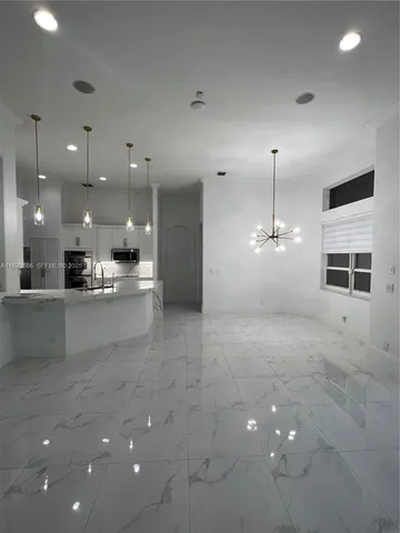 $6,000 | 6013 Northwest 56th Drive, Unit 6013, Coral Springs, FL 33067