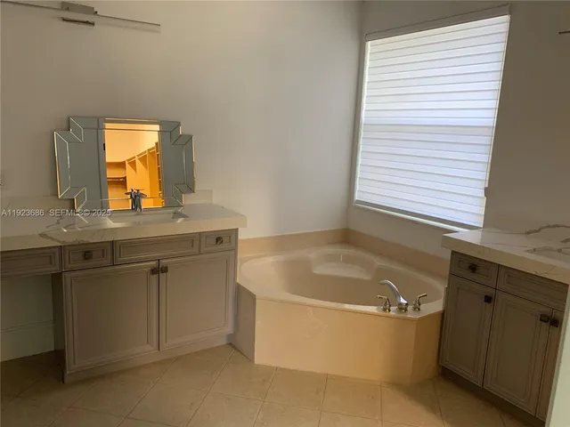 $6,000 | 6013 Northwest 56th Drive, Unit 6013, Coral Springs, FL 33067