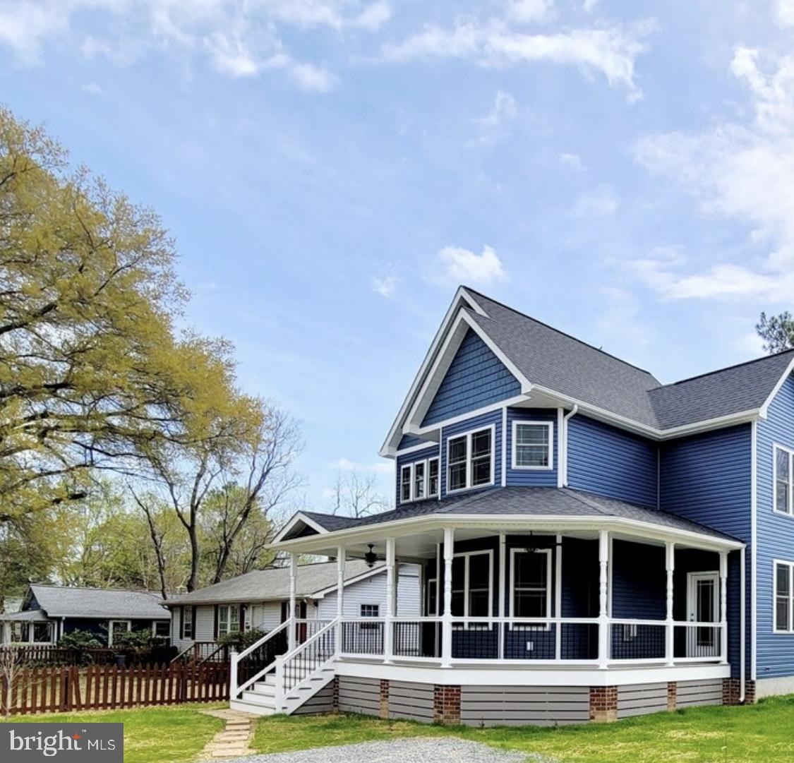 126 4th Street Colonial Beach, VA 22443 - Photo 2 of 54 Enjoy the days relaxing on your wrap around Porch