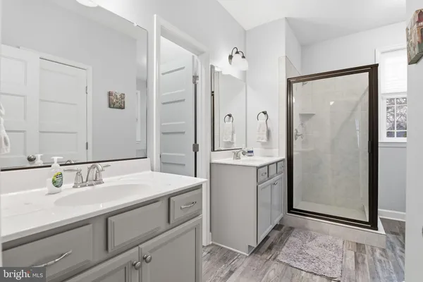 a bedroom with a bed and closet