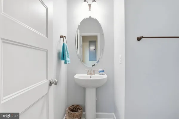 a white bath tub sitting next to a window