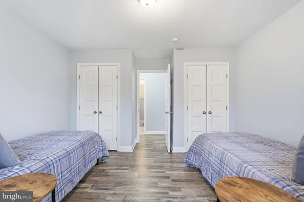 a workspace room with furniture and window