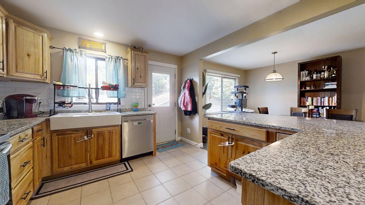 2605 Trafalgar Square Champaign, IL 61821 - Photo 13 of 42 a kitchen with a stove sink and cabinets